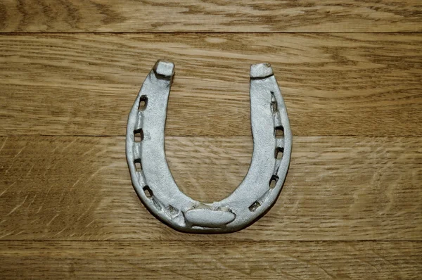 Old iron rusty metal horseshoe — Stock Photo, Image