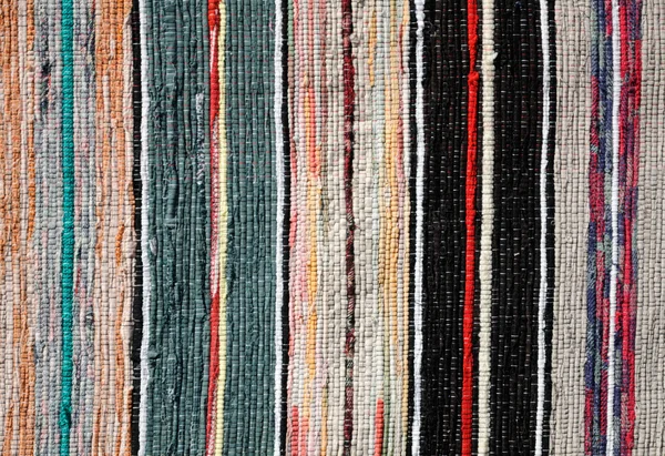 Pestrý koberec textil textilie textura — Stock fotografie