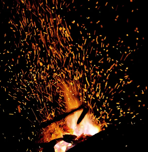 Smithy fire flame tips with sparks closeup — Stock Photo, Image