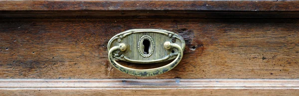 Handle  of the drawer of an antique furniture. — Stock Photo, Image