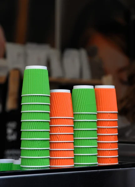 Paper coffee cup in coffee shop — Stock Photo, Image