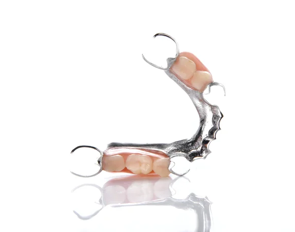 False teeth on white background. — Stock Photo, Image