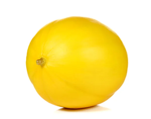 Palla piena melone giallo con etichetta in carta marrone su sfondo bianco — Foto Stock