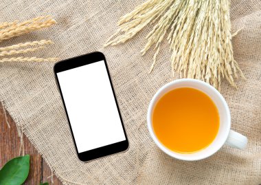 Çul kahverengi zemin üzerine kurutma pirinç suyuyla Orrang.