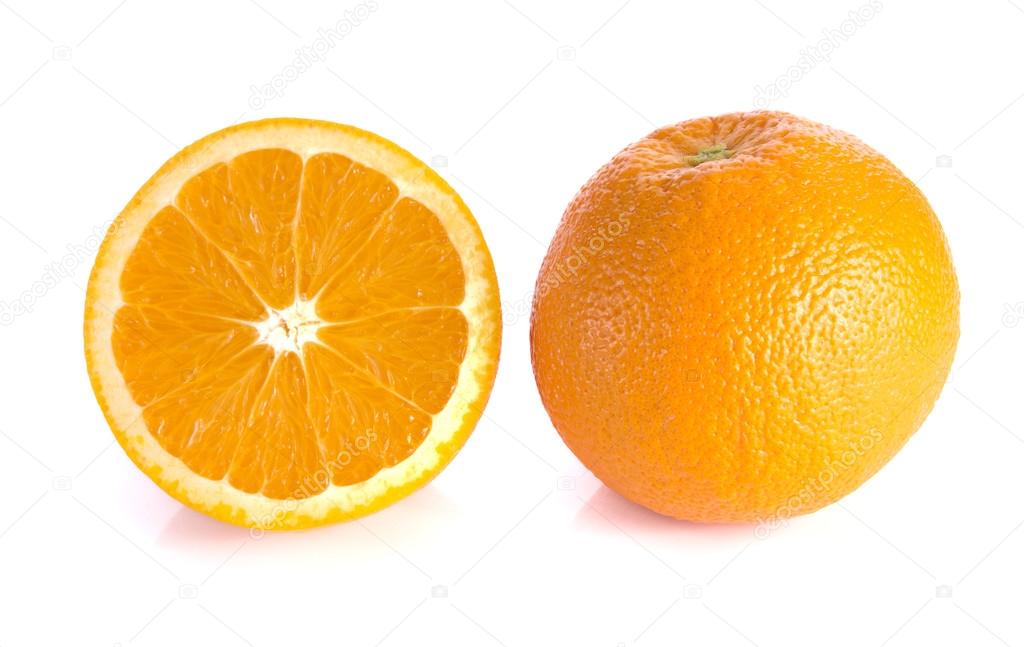 Orange cut half and full balls on white background.