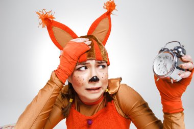 Young woman in the image of red squirrel