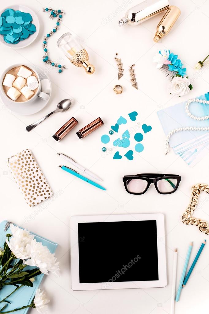 Still life of fashion woman,  blue objects on white