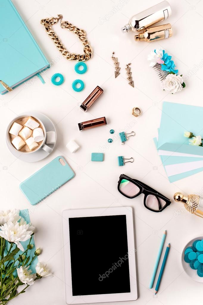 Still life of fashion woman,  blue objects on white