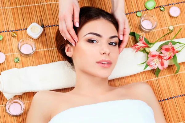 Beautiful young woman at a spa salon