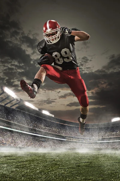 The american football player in action — Stock Photo, Image