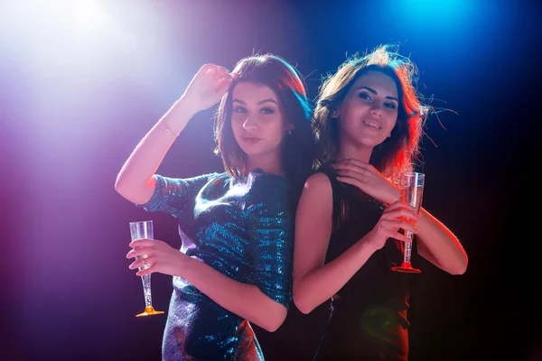 Two beautiful girls dancing at the party — Stock Photo, Image