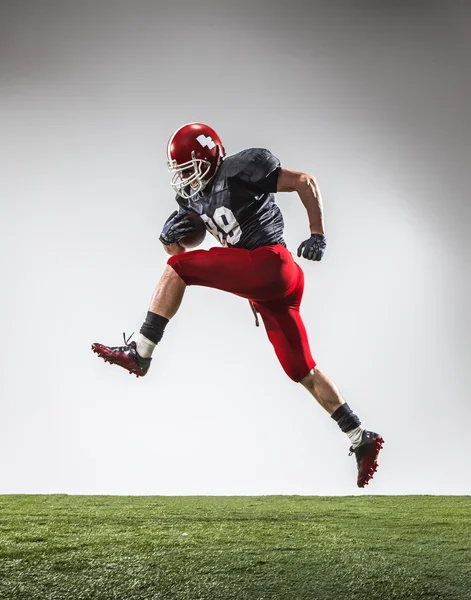 The american football player in action — Stock Photo, Image