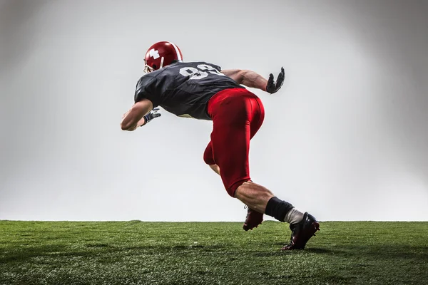 The american football player in action — Stock Photo, Image