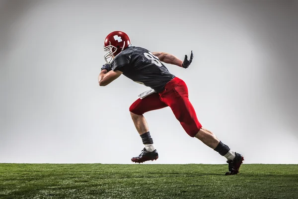 De american football-speler in actie — Stockfoto