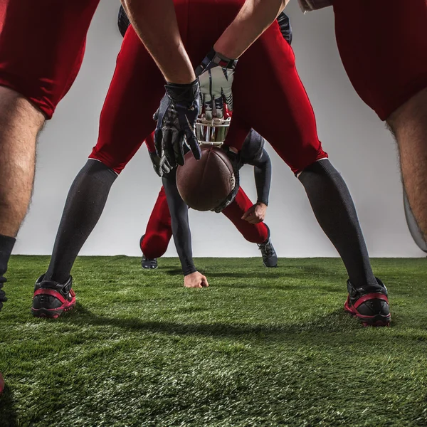 Die drei amerikanischen Fußballspieler in Aktion — Stockfoto