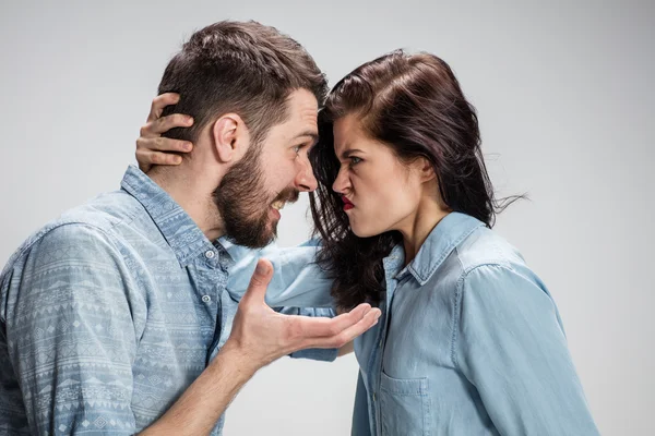 The young couple with different emotions during conflict — Stock Photo, Image