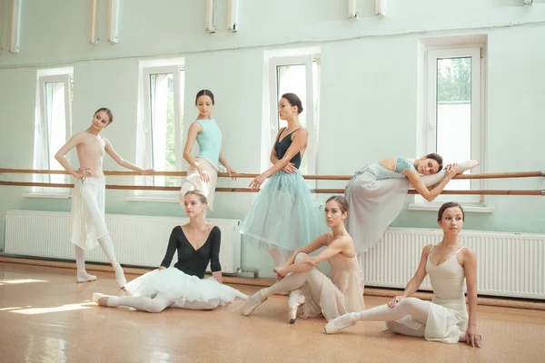 The seven ballerinas at ballet bar — Stock Photo, Image