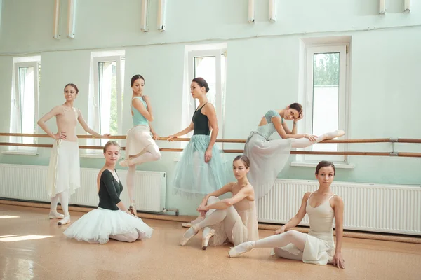 The seven ballerinas at ballet bar — Stock Photo, Image