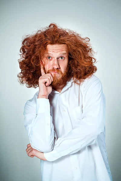 Portrait of young man with shocked facial expression — Stock Photo, Image