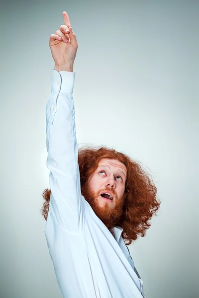 Portrait of young man with shocked facial expression — Stock Photo, Image