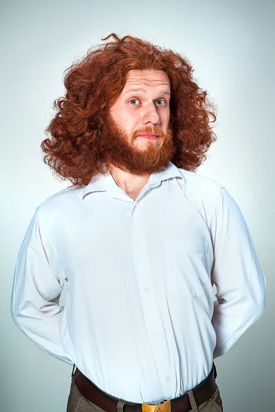 Portrait of young man with shocked facial expression — Stock Photo, Image