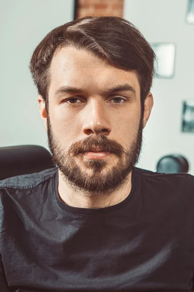 The young man looking at camera — Stock Photo, Image