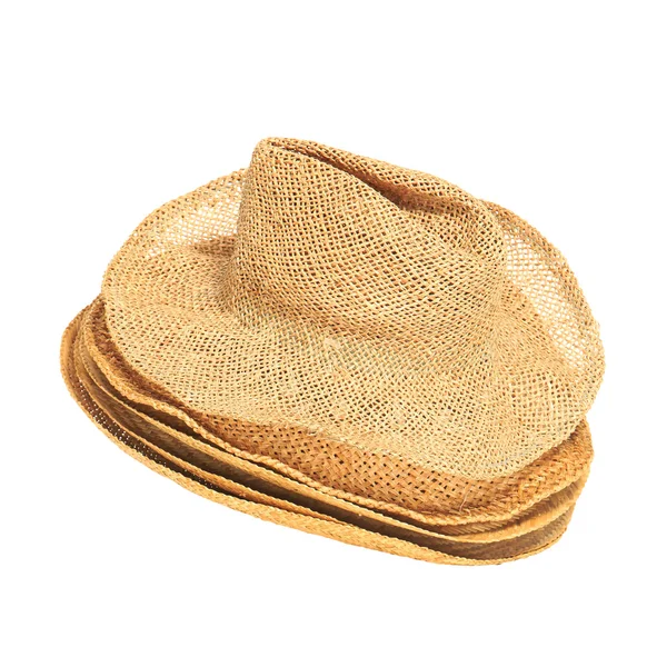 O lote de chapéus de palha isolado no fundo branco . — Fotografia de Stock