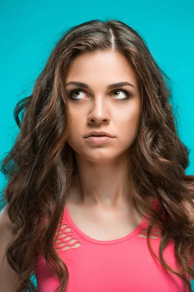 The young womans portrait with thoughtful emotions — Stock Photo, Image