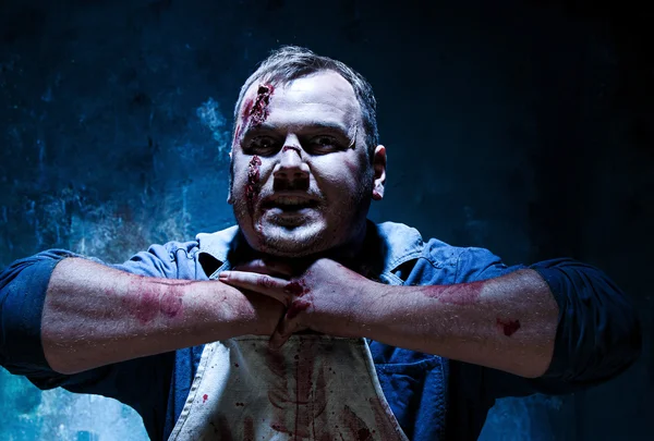 Bloody Halloween téma: šílený vrah jako řezník — Stock fotografie