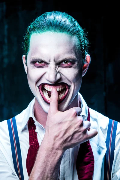 Sangrento tema de Halloween: cara de coringa louco — Fotografia de Stock