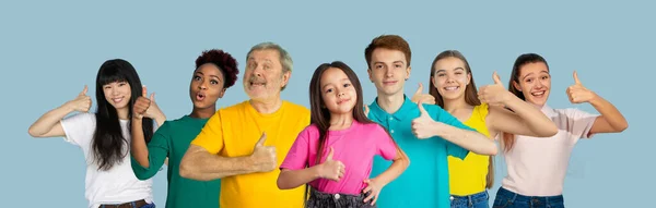 Portrait of young people on light blue studio background, collage — Stock Photo, Image