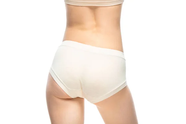 Schöne weibliche Rücken isoliert auf weißem Hintergrund. Beauty, Kosmetik, Wellness, Enthaarung, Diät, Behandlungs- und Fitnesskonzept, sinnliche Pose — Stockfoto