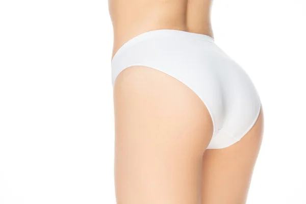 Feche a bela mulher em roupa interior isolada no fundo branco. Beleza, cosméticos, spa, depilação, dieta, tratamento e conceito de fitness, posando sensual — Fotografia de Stock