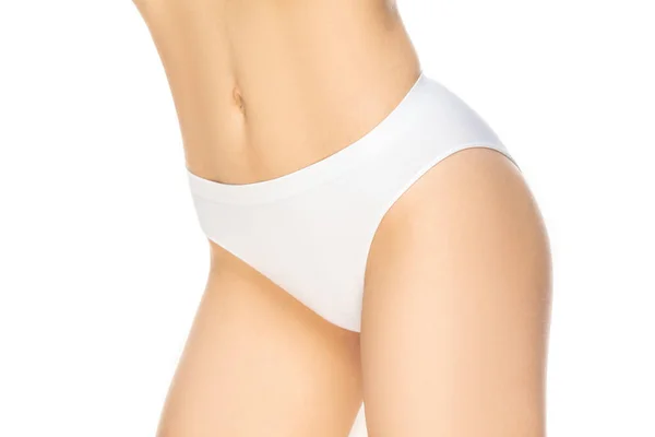 Feche a bela mulher em roupa interior isolada no fundo branco. Beleza, cosméticos, spa, depilação, dieta, tratamento e conceito de fitness, posando sensual — Fotografia de Stock