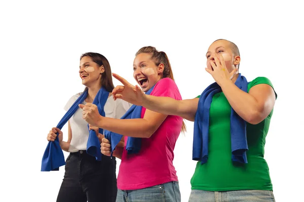 Female soccer fans cheering for favourite sport team with bright emotions isolated on white studio background — Stock Photo, Image
