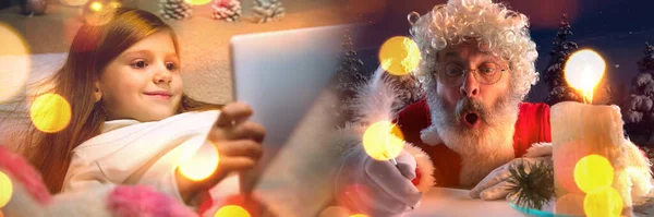 Ευτυχισμένο καυκάσιο κοριτσάκι κατά τη διάρκεια βιντεοκλήσης ή μηνυμάτων με τον Άγιο Βασίλη χρησιμοποιώντας φορητούς υπολογιστές και οικιακές συσκευές, γιορτή ή διαφημιστικό φυλλάδιο με copyspace — Φωτογραφία Αρχείου
