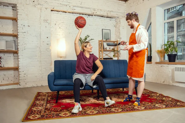 Gender stereotypes. Wife and husband doing things unusual for their genders in social meanings — Stock Photo, Image