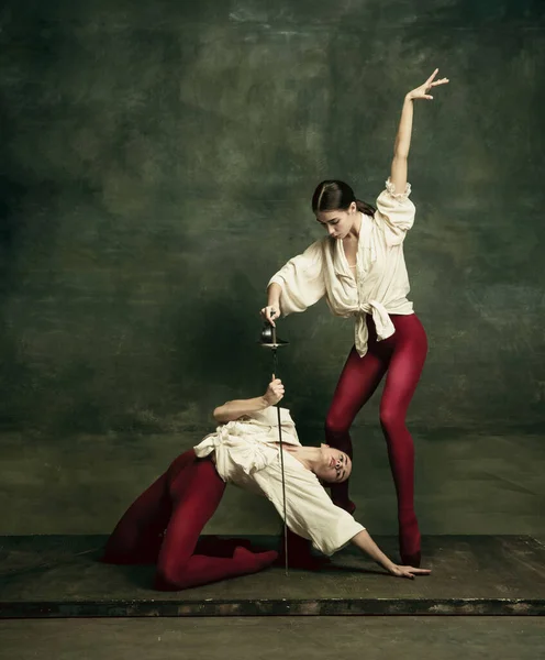 Two young female ballet dancers like duelists with swords. Ballet and contemporary choreography concept. Creative art photo. — Stock Photo, Image