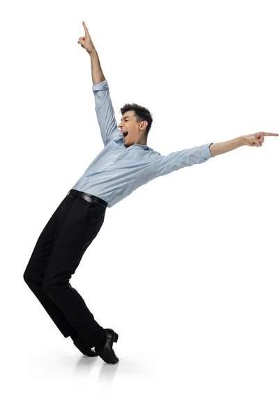 Happy young man dancing in casual clothes or suit, remaking legendary moves of celebrity from culture history — Stock Photo, Image