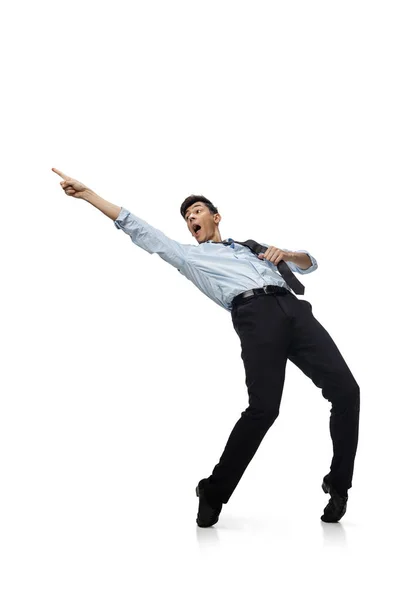 Happy young man dancing in casual clothes or suit, remaking legendary moves of celebrity from culture history — Stock Photo, Image