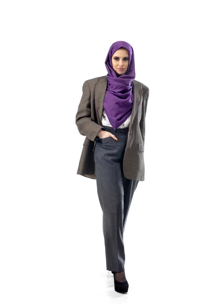 Beautiful arab woman posing in stylish office attire isolated on studio background. Fashion concept — Stock Fotó