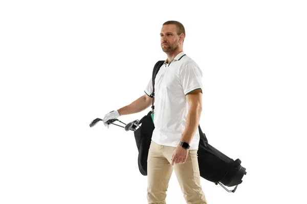 Golf player in a white shirt practicing, playing isolated on white studio background — Stock fotografie