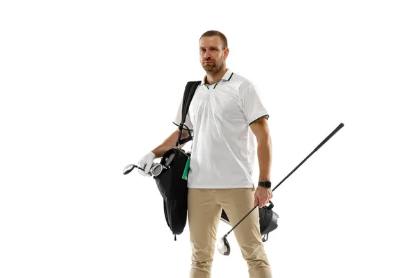 Golf player in a white shirt practicing, playing isolated on white studio background — Stock fotografie