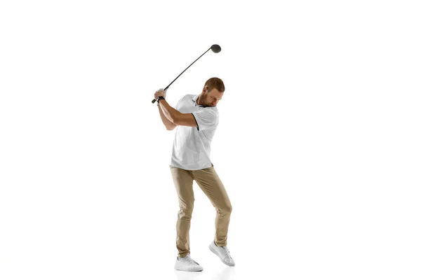 Golf player in a white shirt taking a swing isolated on white studio background — Stock Photo, Image