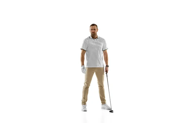 Golf player in a white shirt practicing, playing isolated on white studio background — Stok fotoğraf