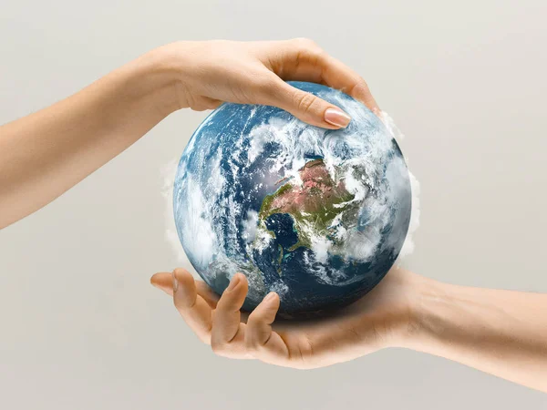 Hands holding planet Earth, close up. Environment save, taking care of nature and ecology, supporting hands concept — Stock Photo, Image