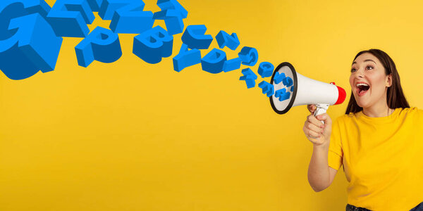 Woman shouting with megaphone, loudspeaker on studio background. Sales, offer, business, cheering fun concept.