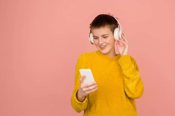 Caucasian girls portrait isolated on coral pink studio background with copyspace — Stock Photo, Image