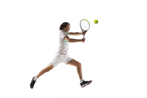 Young caucasian professional sportsman playing tennis isolated on white background — Stock Photo, Image