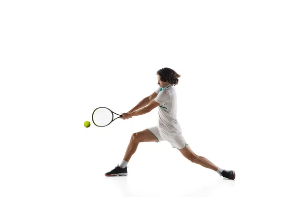 Young caucasian professional sportsman playing tennis isolated on white background — Stock Photo, Image